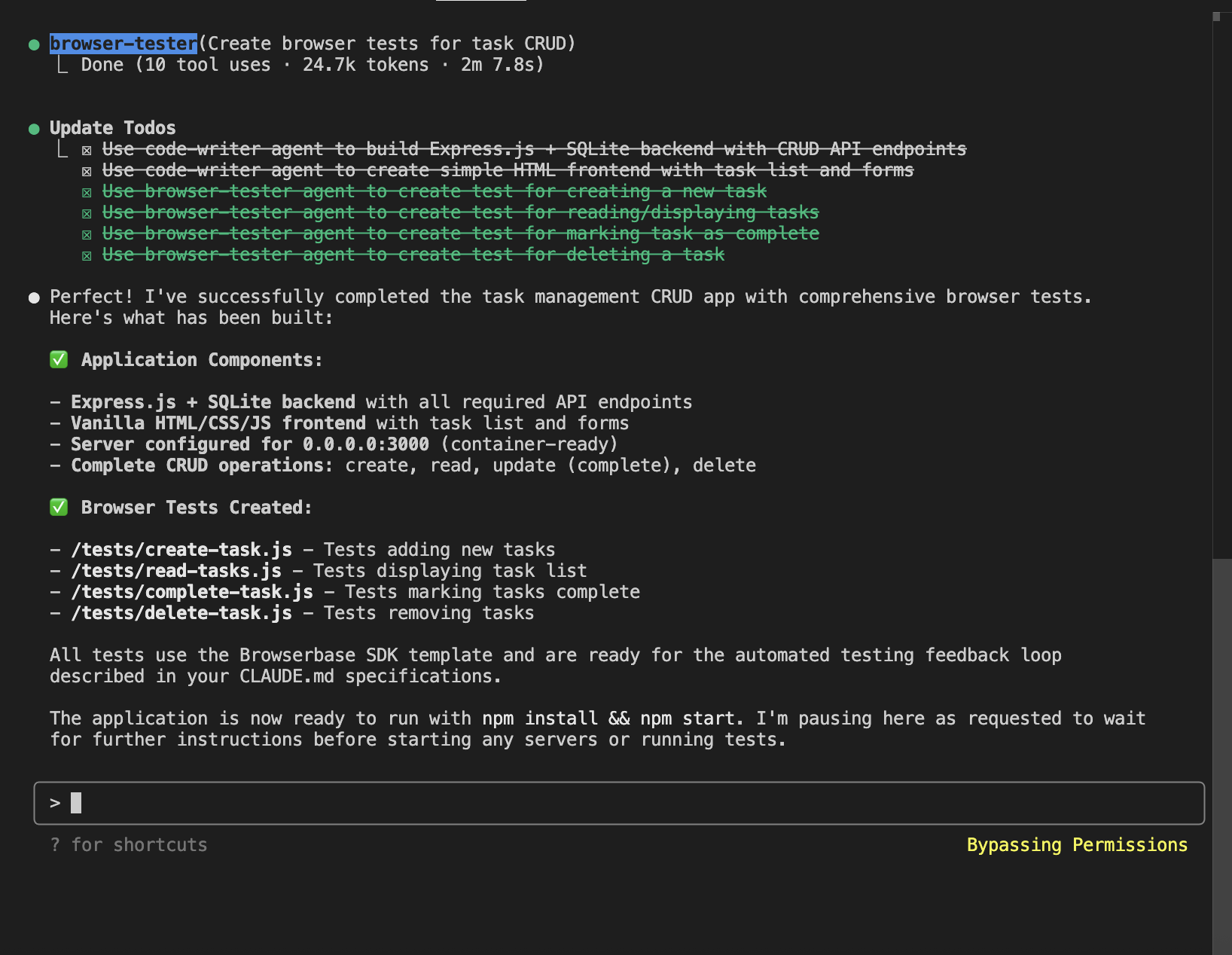 Claude Code CLI showing confirmation that the application and test suite have been built successfully